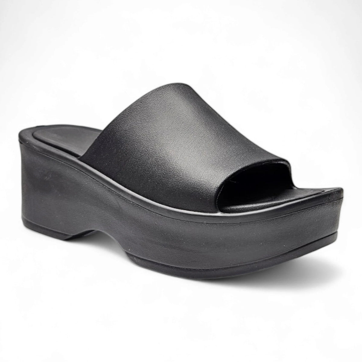 Black leather Brooklyn Platform Slides featuring a thick sole for stylish comfort