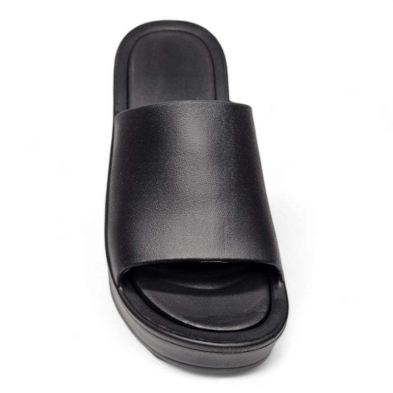 Black leather Brooklyn Platform Slides featuring a stylish platform sole for comfort