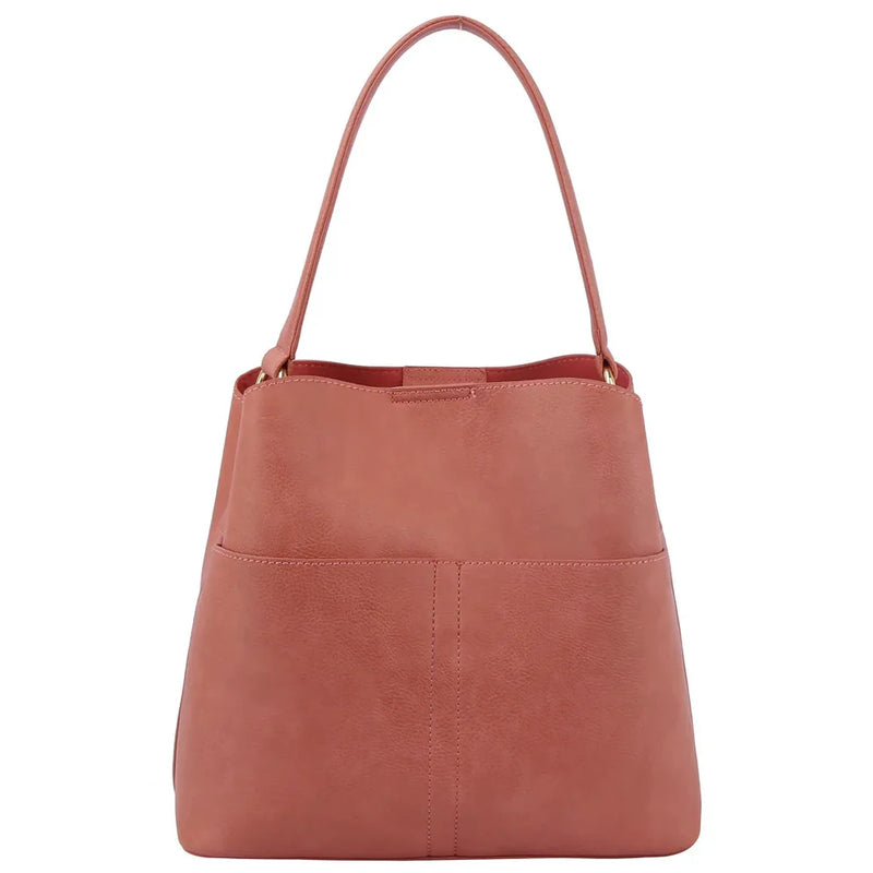 Pink leather Bucket Hobo Bag with a curved handle and guitar strap for stylish comfort