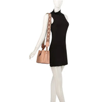 Black sleeveless mini dress showcased on a mannequin with Buckle Flap Shoulder Bag