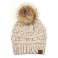 Knitted beige C.C. Natural Pom Knit Beanie with fluffy pompom on top