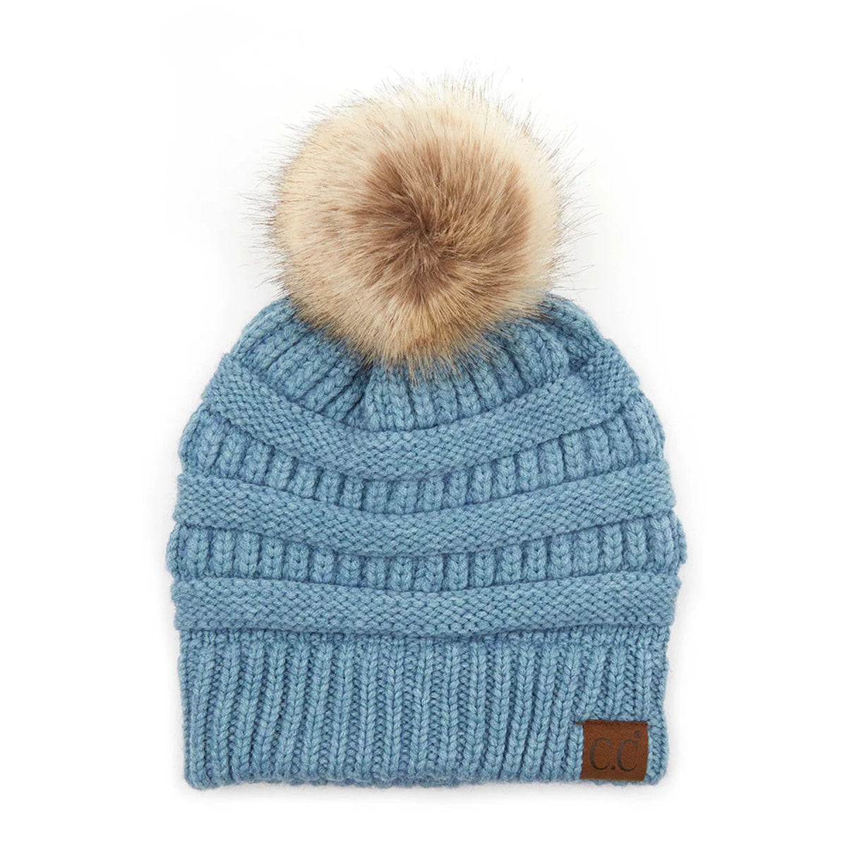 Blue knit winter hat with beige fur pom-pom from C.C. Natural Pom Knit Beanie