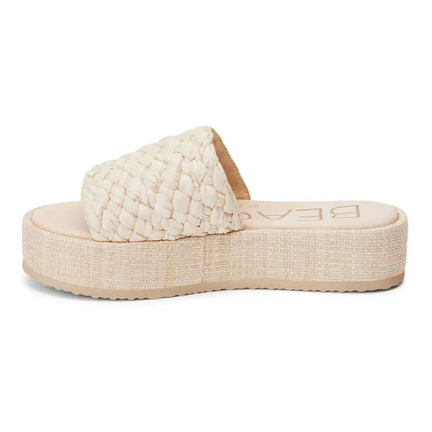 Cream-colored Cairo Raffia Platform Sandal featuring a woven design and textured sole