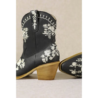 Black Carolina Flora Cowgirl Bootie with white floral embroidery and wooden heel