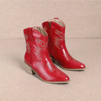 Bright red leather Casey Cowgirl Ankle Bootie with decorative stitching design