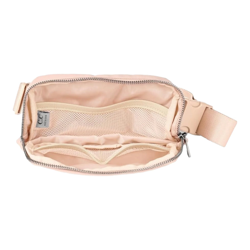 Pale pink CC Waterproof Belt Bag with open zipper and interior compartments displayed