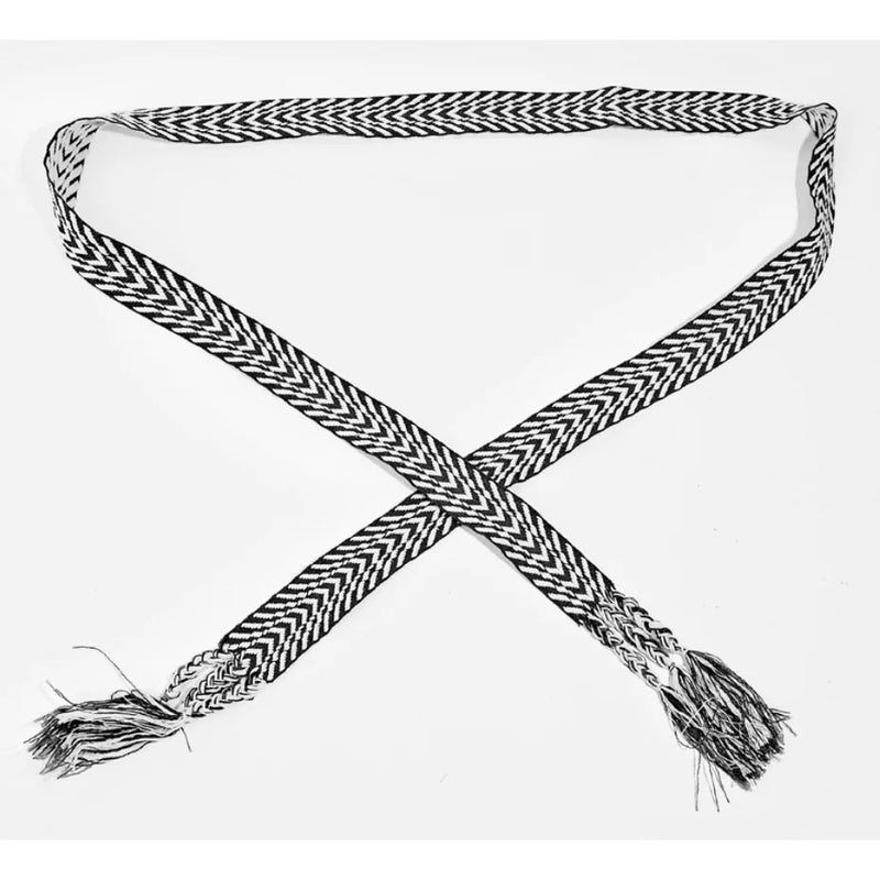 Chevron Stripe Pattern Braided Belt with tasseled ends crossed in an X shape