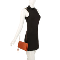 Black sleeveless mini dress with Chic Zipper Braid Crossbody Clutch on a mannequin