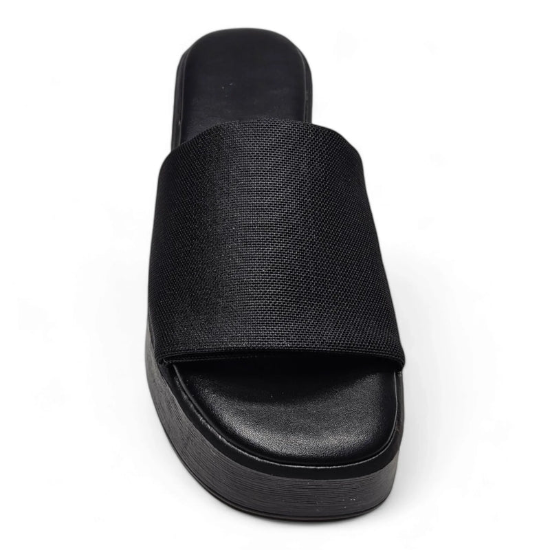 Black platform slide sandal with a wide fabric strap from the Wide Band Wedge collection