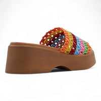 Colorful crocheted platform sandal with thick brown sole, perfect wide band wedge style