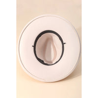 White cowboy hat with dark band featuring a concho chain flat brim design