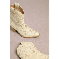 White leather Corral Cowgirl Bootie with floral embroidery and wood grain heel