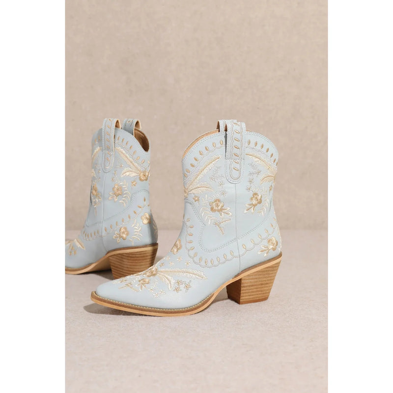 Light blue Corral Cowgirl Bootie with floral embroidery and wooden heels