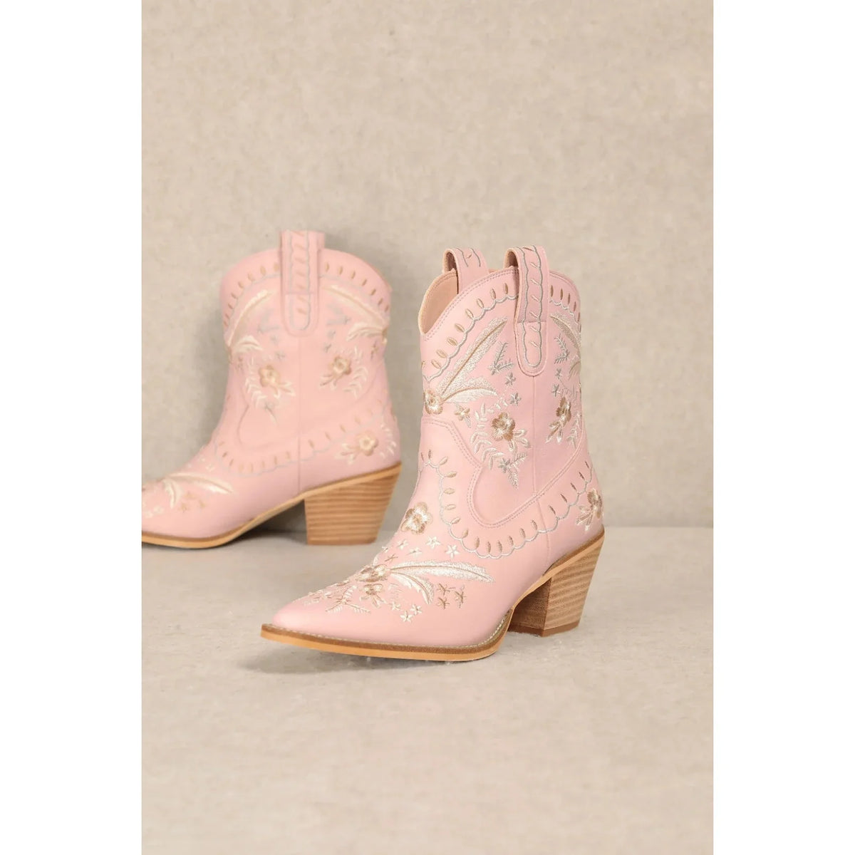 Pair of pink Corral Cowgirl Bootie with decorative stitching and embroidery