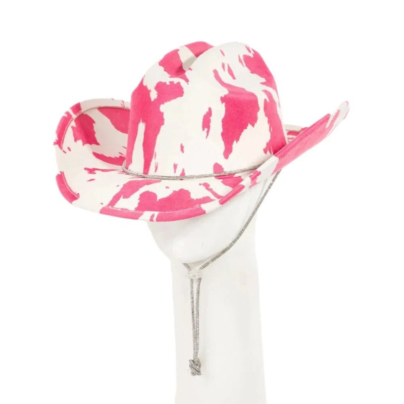 Pink and white cowboy hat on a martini glass for Cow Print Draw String Cowboy Hat