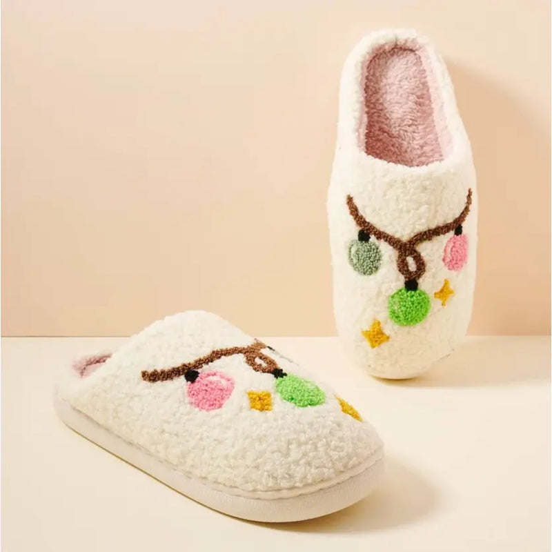 Cozy Christmas Light Bulb Slippers featuring white fuzzy design with colorful ornaments