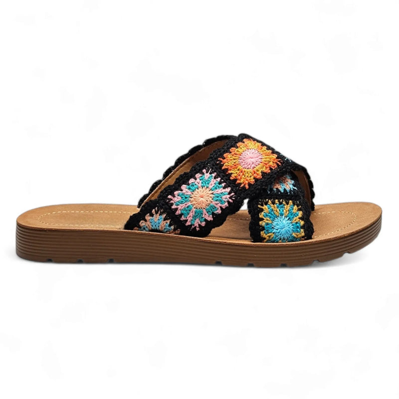 Colorful criss cross crochet slides with floral pattern on black fabric strap