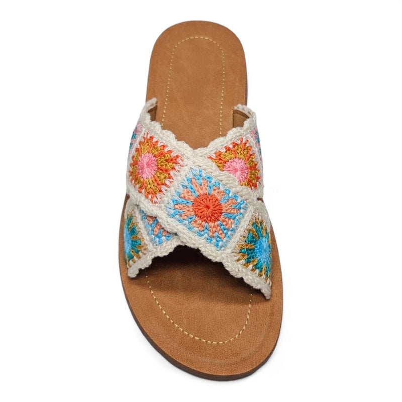 Colorful Criss Cross Crochet Slides featuring a tan leather sole and floral pattern