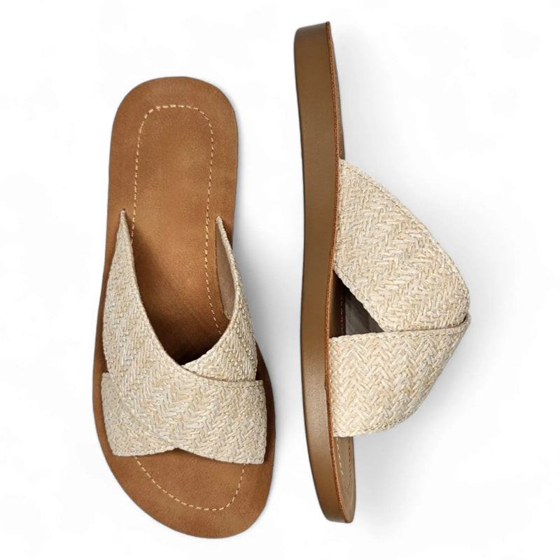 Beige woven criss cross sandal slides with brown soles for stylish comfort