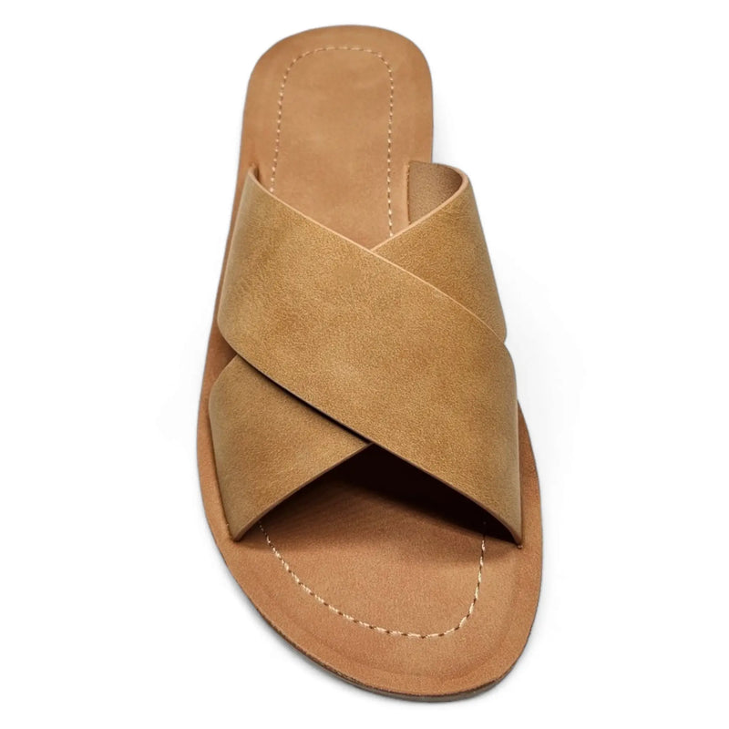 Tan criss cross sandal slides featuring stylish crisscrossing straps