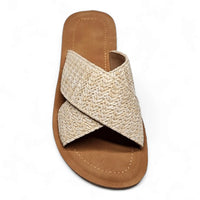 Woven straw criss cross sandal slides with tan leather sole and crisscrossing straps