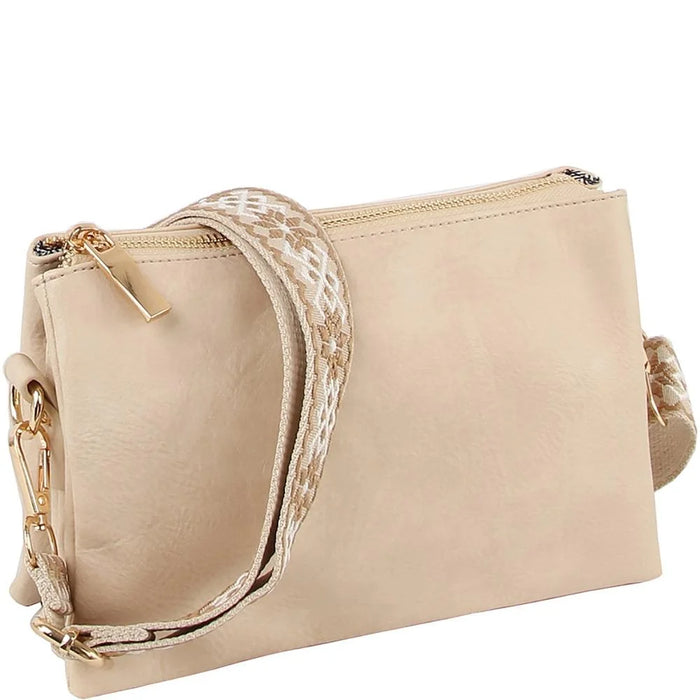 Beige leather crossbody bag clutch with stylish snakeskin-patterned strap