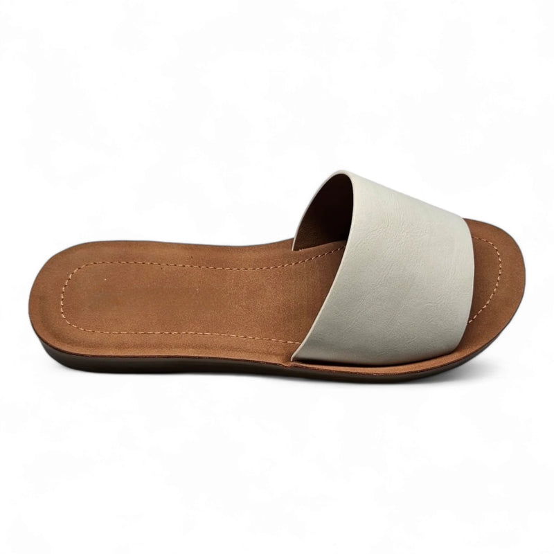 White leather slide sandal with tan sole from Daily Slip On Flat Sandal collection