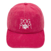 Pink Dog Mom Cap with white embroidery of ’DOG MOM’ and a paw print design