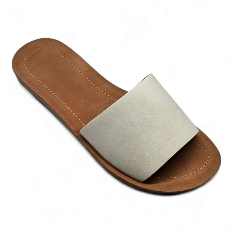 White leather slide sandal with tan sole from Daily Slip On Flat Sandal collection