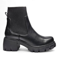 Black leather Elastic Shaft Lug Bootie with chunky platform sole and ribbed side panel