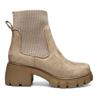 Beige suede elastic shaft lug bootie with chunky platform and ribbed side panel