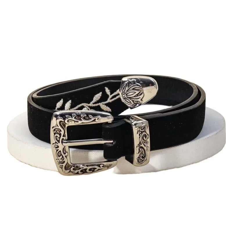 Black leather belt with ornate silver buckle, perfect for an Embroidered Suede Western style