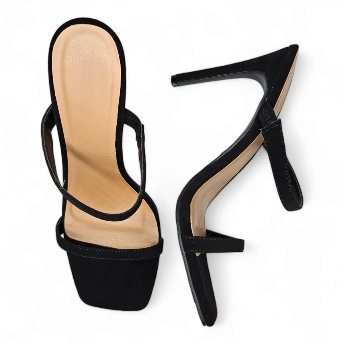 Double Strap Stiletto featuring a pair of black high-heeled sandals with thin straps