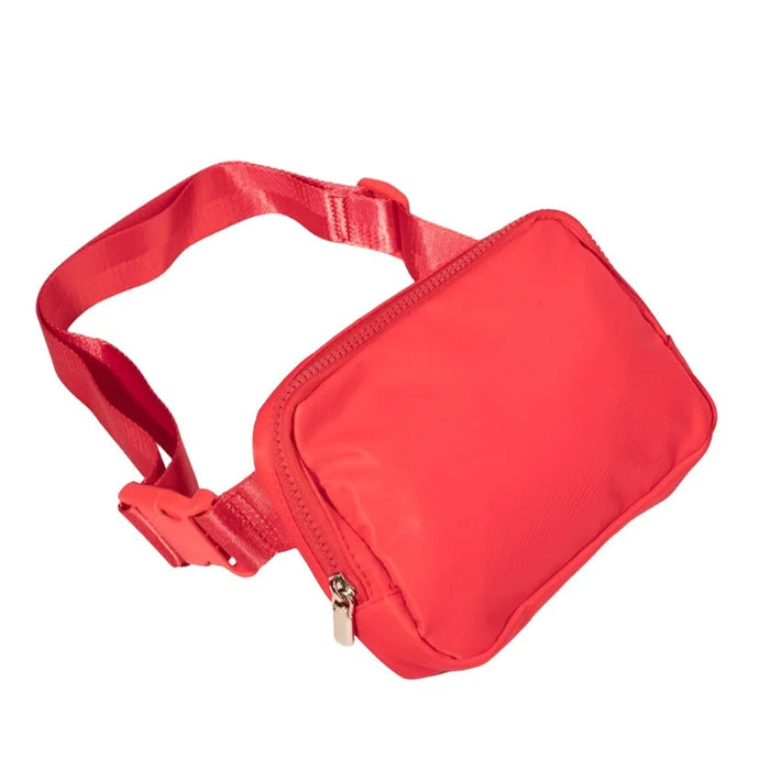 Red Everyday Belt Bag featuring an adjustable strap and zipper closure for convenience