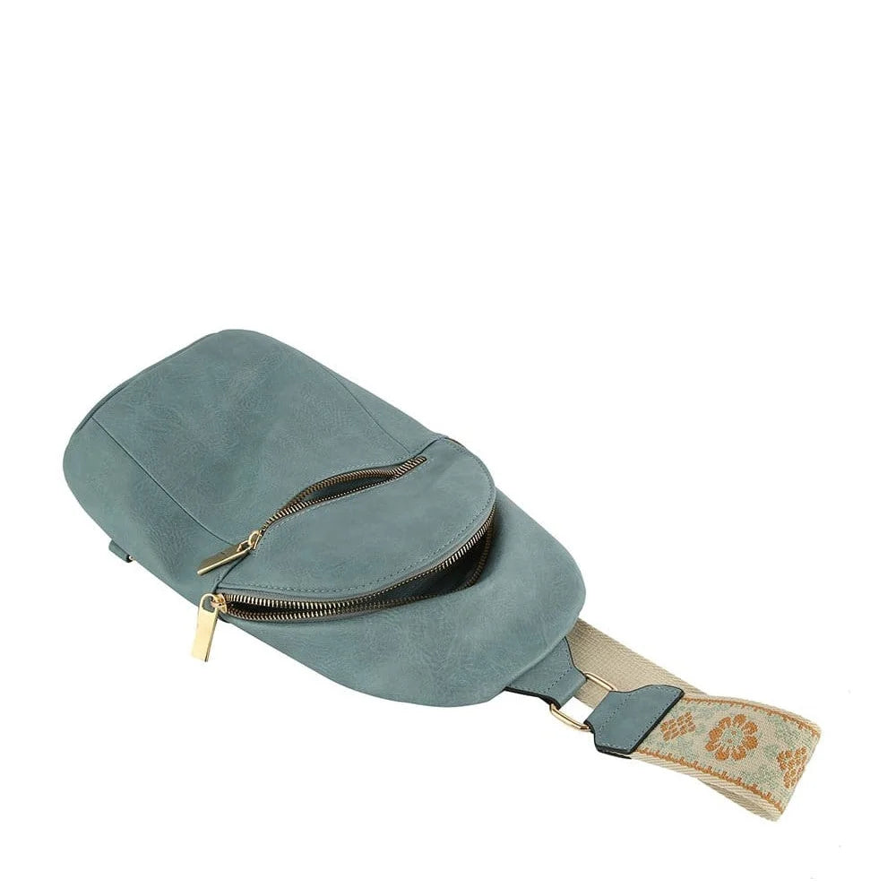 Teal leather strap sling bag with decorative fabric strap from Fashion Zipper Strap collection