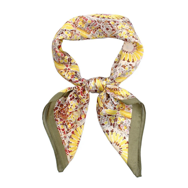 Floral patterned silk scarf in yellow and green showcasing a vibrant firework print