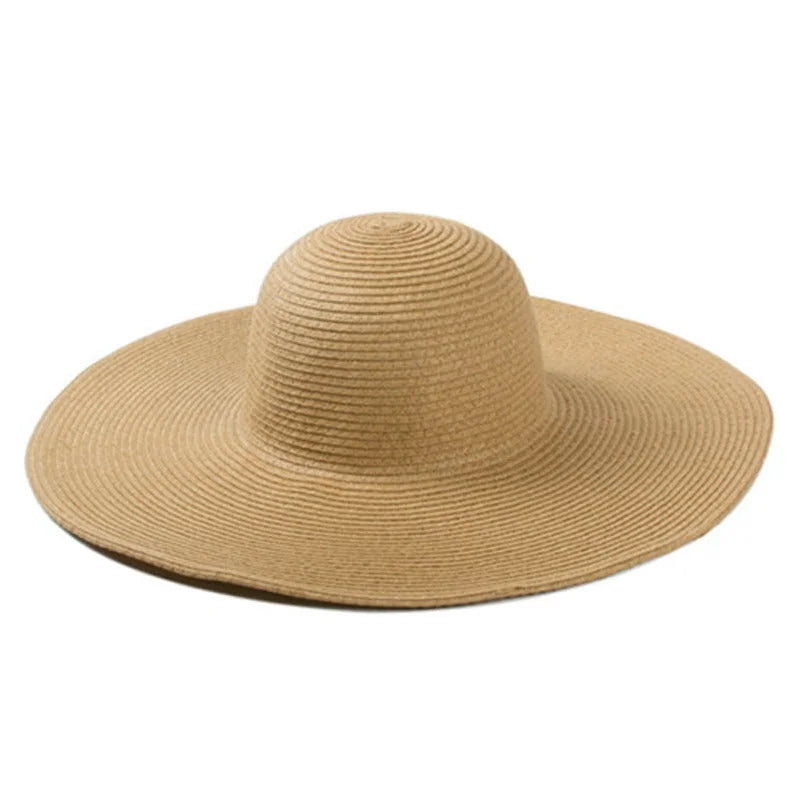 Wide-brimmed beige floppy oversized sun hat for stylish sun protection