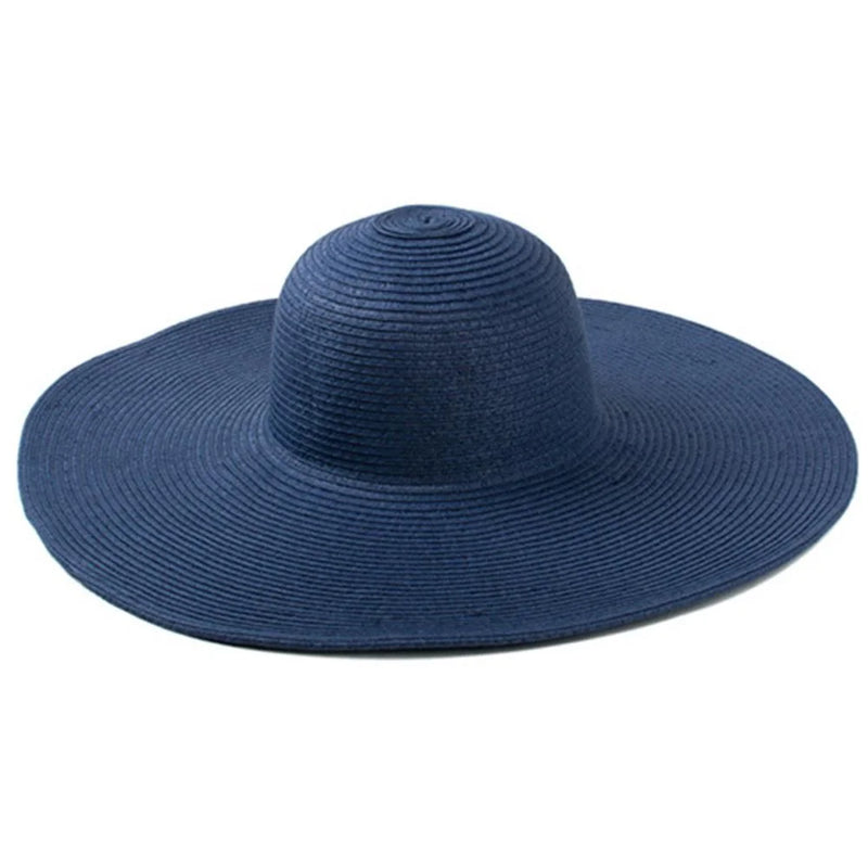 Wide-brimmed navy blue floppy oversized sun hat with circular ridges for sun protection