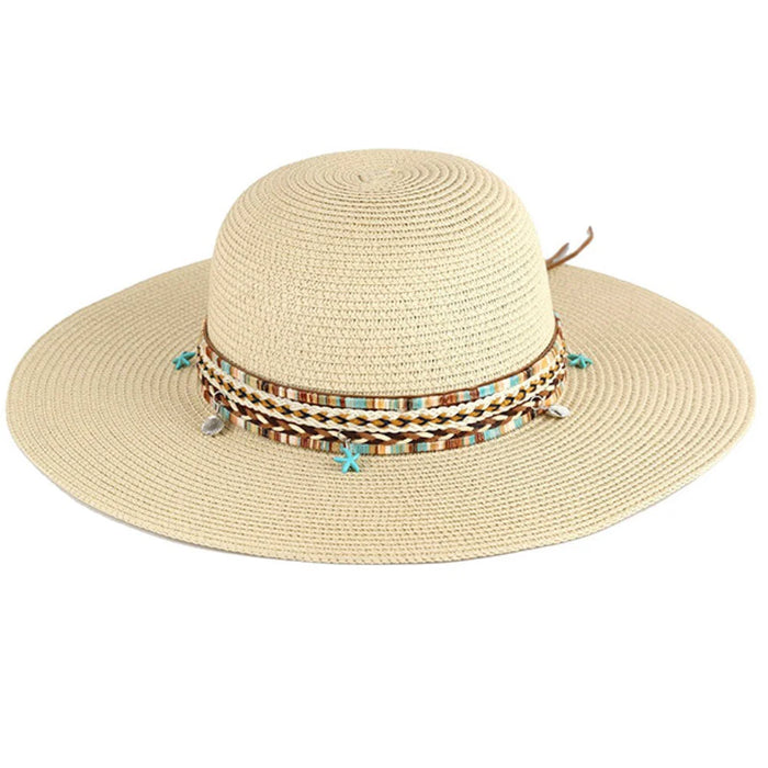 Floppy straw hat with boho sea life band featuring beads and charms for sun protection