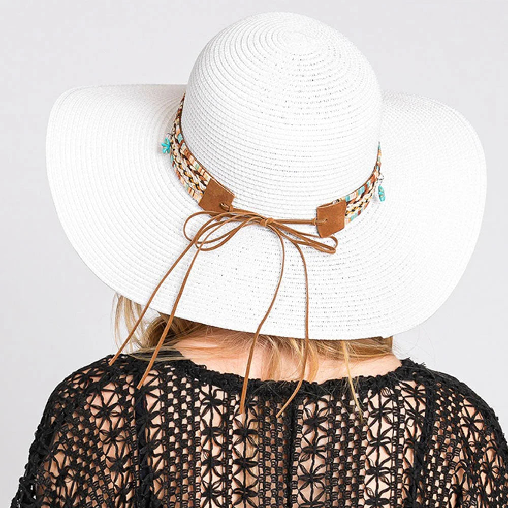 White floppy straw hat with boho sea life band, perfect for sun protection and style