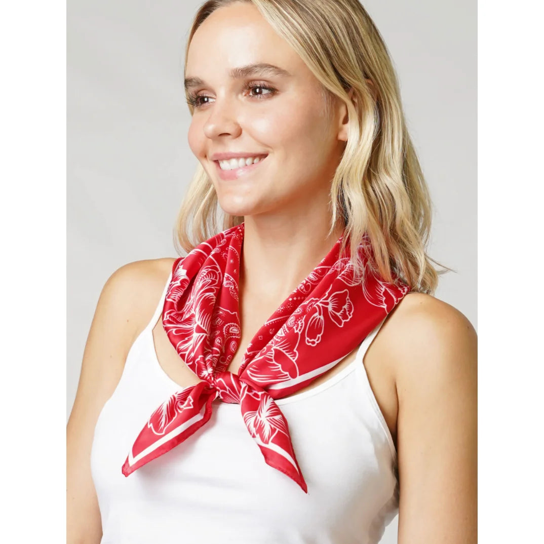 Smiling blonde woman showcasing a Floral Bandana Satin Scarf Wrap in a white top