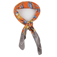 Floral Pattern Silk Scarf knotted with a beautiful orange, blue, and gray design