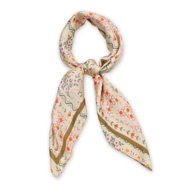 Floral Print Satin Scarf elegantly tied in a loop, showcasing a vibrant floral pattern