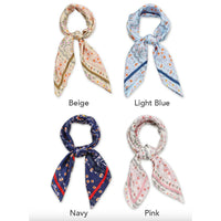 Four floral print satin scarves in vibrant colors and elegant floral patterns