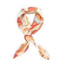 Colorful Floral Print Silky Bandana tied in a loop with pastel abstract patterns