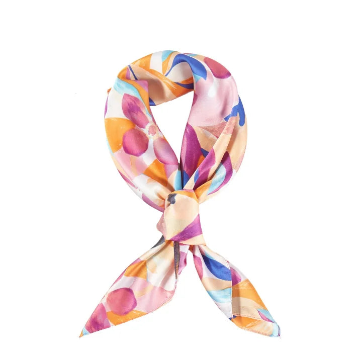 Colorful floral print silky bandana with geometric patterns tied in a loop