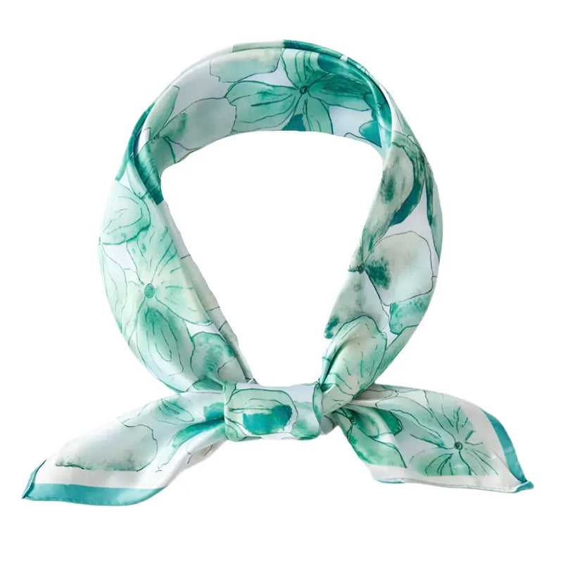 Silk scarf with mint green floral pattern tied in a knot for Floral Print Silky Bandana