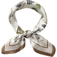 Floral patterned silk flower print scarf elegantly tied in a loop for stylish wear