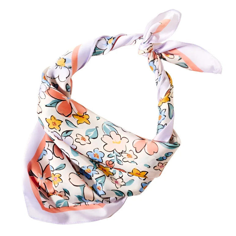 Floral-patterned silk scarf tied in a triangle from the Flower Print Silky Scarf Wrap