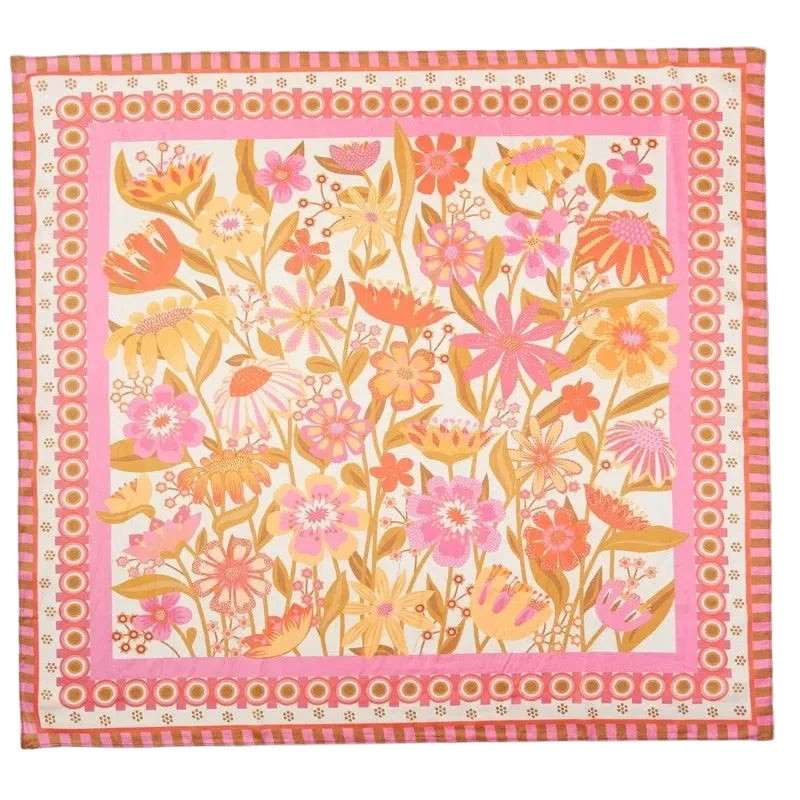 Floral patterned fabric with pink border on a white background